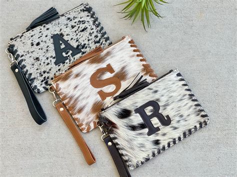 cowhide wristlet yorkdale